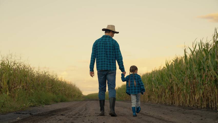 A family walking their land